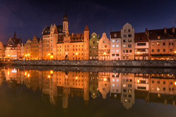 Medieval waterfront reflecting in Motlawa river, Gdansk, Poland