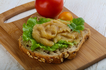 Herring caviar sandwich