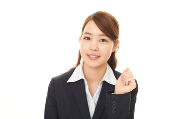 ガッツポーズのビジネスウーマン