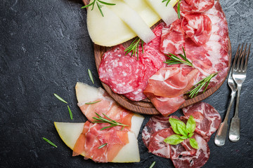  Italian ham, prosciutto and salami with melon.