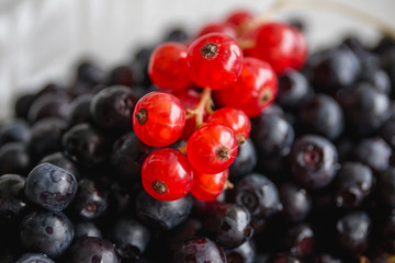 a combination of black and red berries (blackberries and red cur