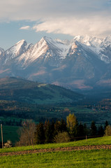 Plakat Beautiful spring panorama over Spisz highland to snowy Tatra mountains in the colorful morning, Poland