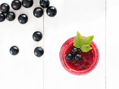 Delicious black currant smoothie with fresh berries