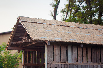 Fototapeta na wymiar Wooden barn in village