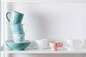 Clean dishes on wooden shelf