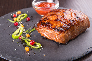 Steak on slate blackboard