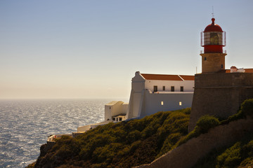 Fototapeta na wymiar lighthouse on top of cliff at Cabo Sao Vicente, Algarve region,