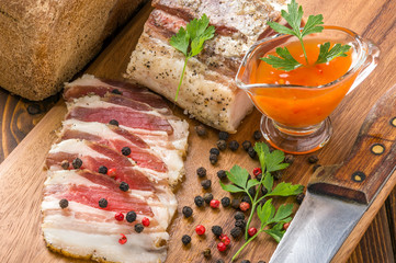 salty bacon on a cutting board