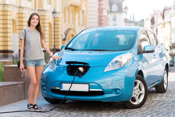 Woman ready to go on electric vehicle