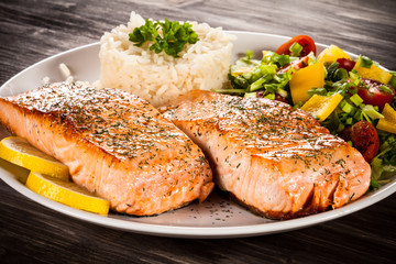 Fried salmon, boiled rice and vegetables