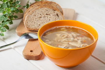 Traditional polish tripe soup with vegetables.