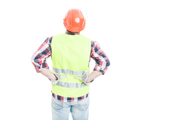 Male engineer holding his hands on lower back