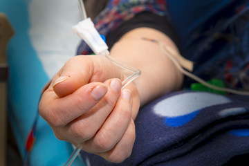 Intravenous infusion therapy on mature woman
