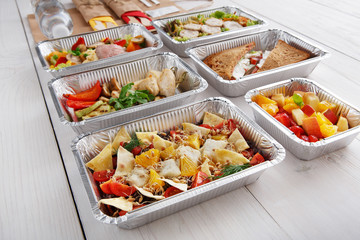 Healthy food in boxes, diet concept.