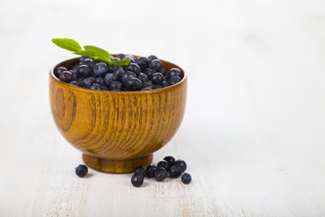 Blueberries in a wooden bowl