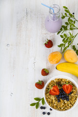 Granola with fruits on a wooden table