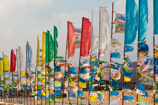 Prayer flags and Hadak at sunset in the Republic of Buryatia. Datsan Rinpoche Bagsha on Bald Mountain in Ulan-Ude, Russia.