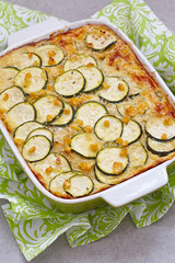 casserole with zucchini, corn and potato in baking dish