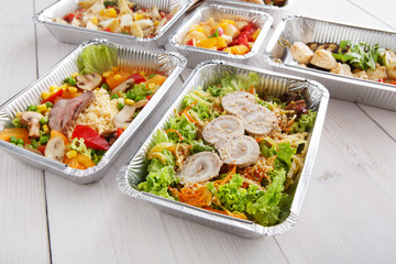 Healthy food in boxes, diet concept.
