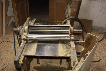 Carpenter tools with wood shaving on wooden table