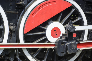 Fototapeta premium Old steam locomotive wheel