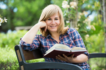 woman book outdoors