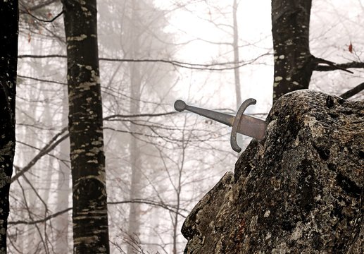 legendary Excalibur sword into the stone in the middle of the fo