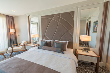 Modern hotel room with big bed