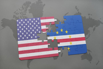 puzzle with the national flag of united states of america and cape verde on a world map background.