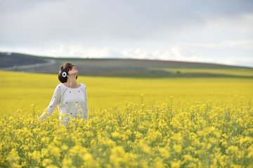 Fototapeta premium Young woman with headphones