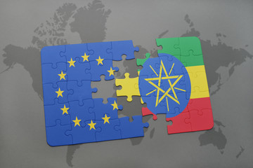 puzzle with the national flag of european union and ethiopia on a world map background.