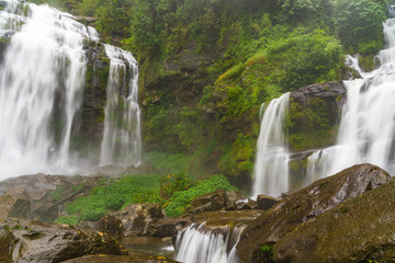 Fototapeta premium Tad Khamude, A big waterfall in deep forest at Bolaven highland