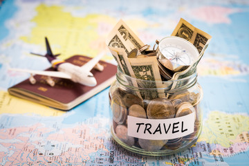 Travel budget concept with compass, passport and aircraft toy - 116612901