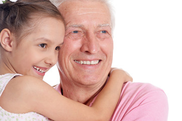 elderly man with  cute granddaughter