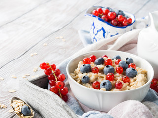 Oatmeal porridge with fresh berries