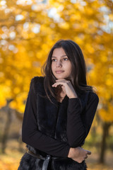 Girl and autumn tress