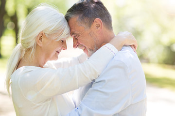 Obraz premium Senior couple standing outdoors 