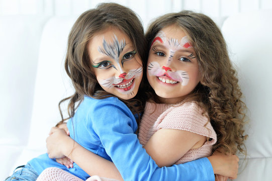 little girls with face painted