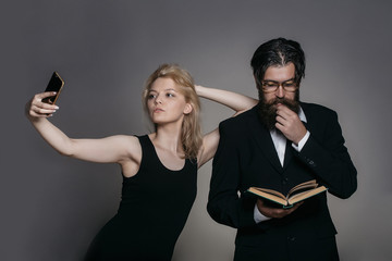 Couple makes selfie and reads