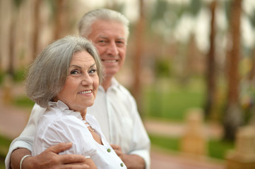 Senior couple near hotel resort