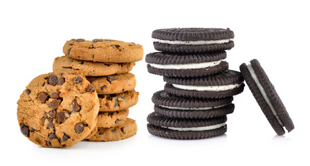 Chocolate chip and sandwich cookies with cream on white backgrou