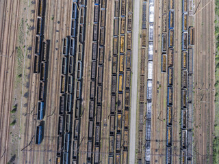 Obraz premium Depot with many railways at day in city at sunny day. View from
