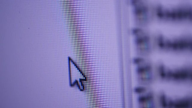 Click OK on computer software interface, mouse cursor in focus