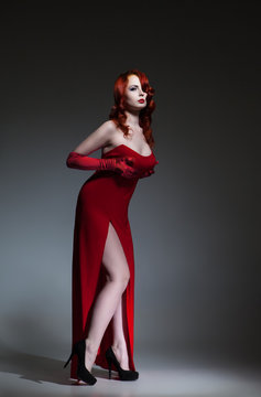 Woman dressed in red elegant dress