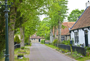 Fototapeta na wymiar View of typical historic street in Ameland, The Netherlands