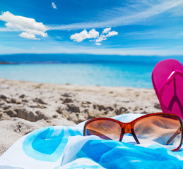blue sky with clouds over sunglasses