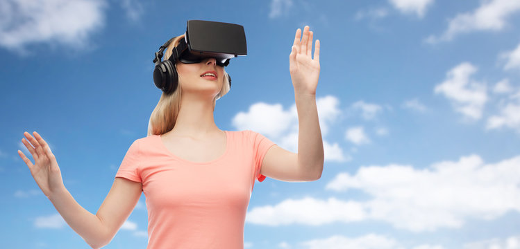 woman in virtual reality headset or 3d glasses