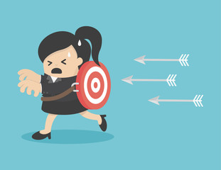 Businesswoman running arrows