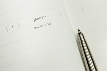 Pen and Organizer book at New Year's Day page
