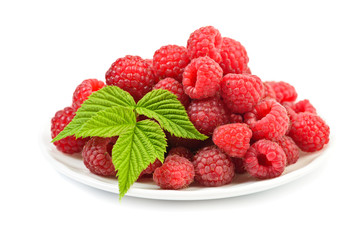 Ripe raspberry with leaf